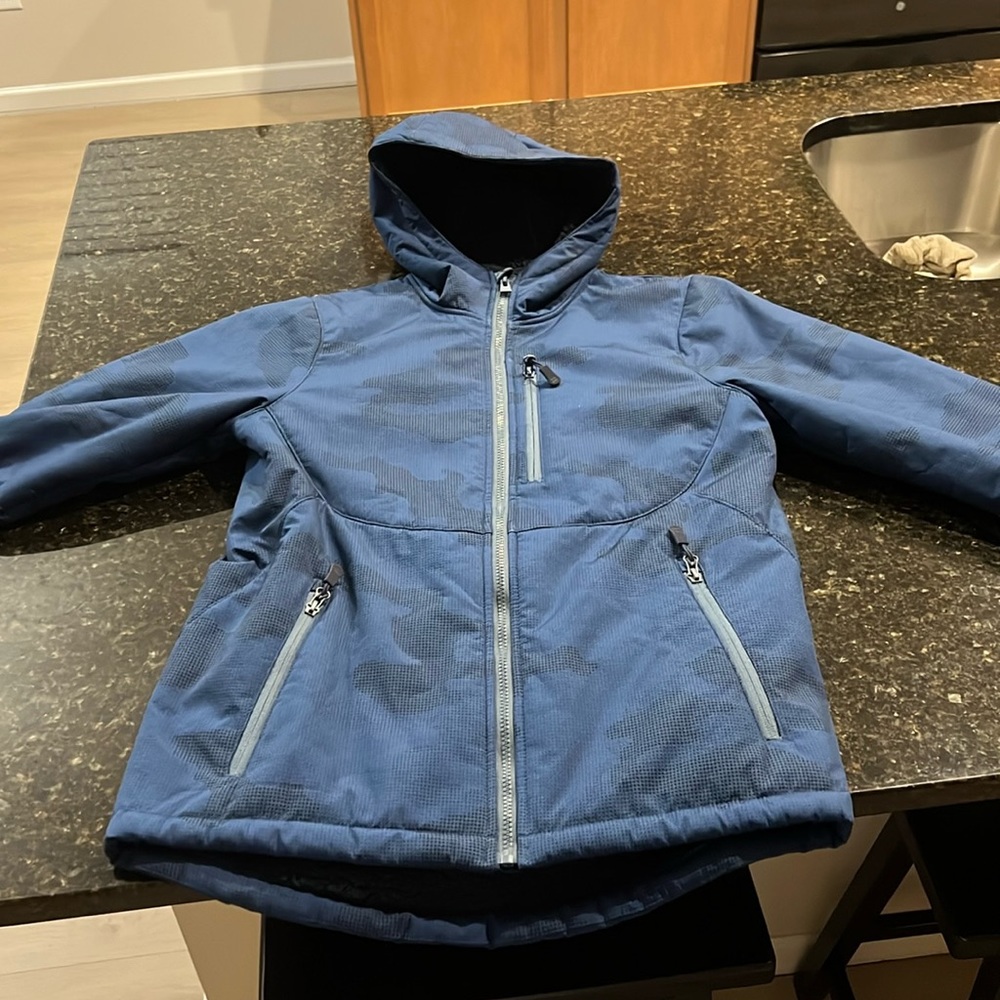 Men’s size small blue and black, hooded zip up jacket with fleece on the inside.